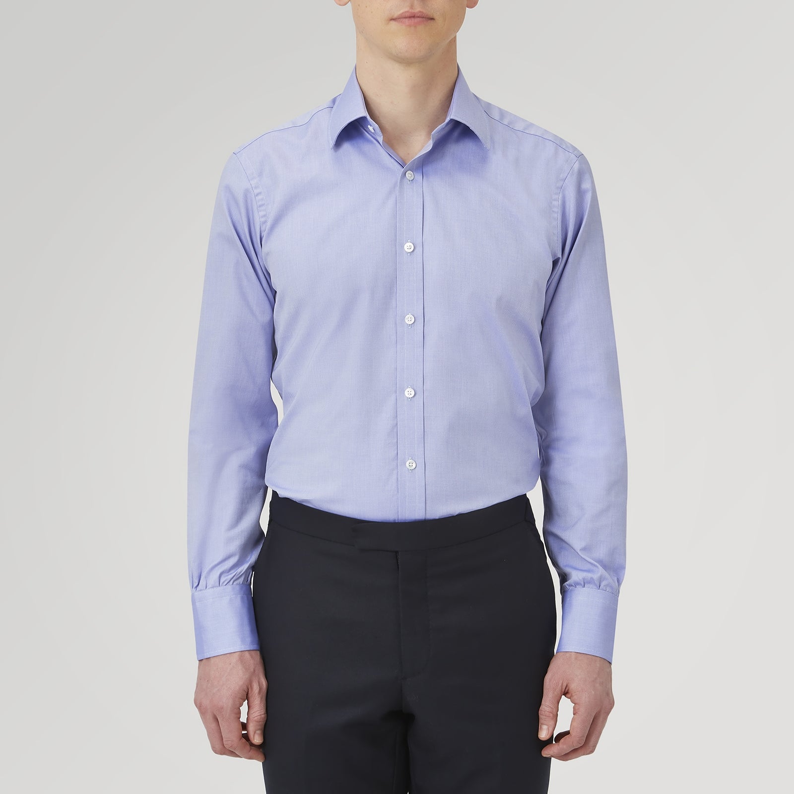 View 2 of product A Blue Superfine Oxford Cotton Shirt by Turnbull & Asser, featuring a T&A collar and 3-button cuffs, is displayed against a plain white background.