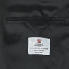 View 2 of product The Turnbull & Asser Black Double Breasted Velvet Smoking Jacket features a shawl collar, decorative frogging closure, and subtle piping on cuffs and edges, ideal for eveningwear and shown against a plain white background.