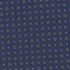 View 3 of product The Turnbull & Asser Navy Floral Spot Silk Tie, featuring a subtle light blue and gray pattern, is rolled up against a plain white background—an ideal accessory for any office shirt.