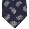 View 4 of product The Turnbull & Asser Navy and Light Pink Floating Paisley Silk Tie features a classic pink and white paisley pattern—a timeless accessory to enhance any wardrobe.