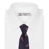 View 2 of product The Turnbull & Asser Navy and Burgundy Floating Paisley Silk Tie is shown rolled up, displaying its repeating paisley design on a plain white background.