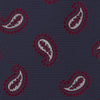 View 3 of product The Turnbull & Asser Navy and Burgundy Floating Paisley Silk Tie is shown rolled up, displaying its repeating paisley design on a plain white background.