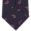 View 4 of product The Turnbull & Asser Navy and Burgundy Floating Paisley Silk Tie is shown rolled up, displaying its repeating paisley design on a plain white background.