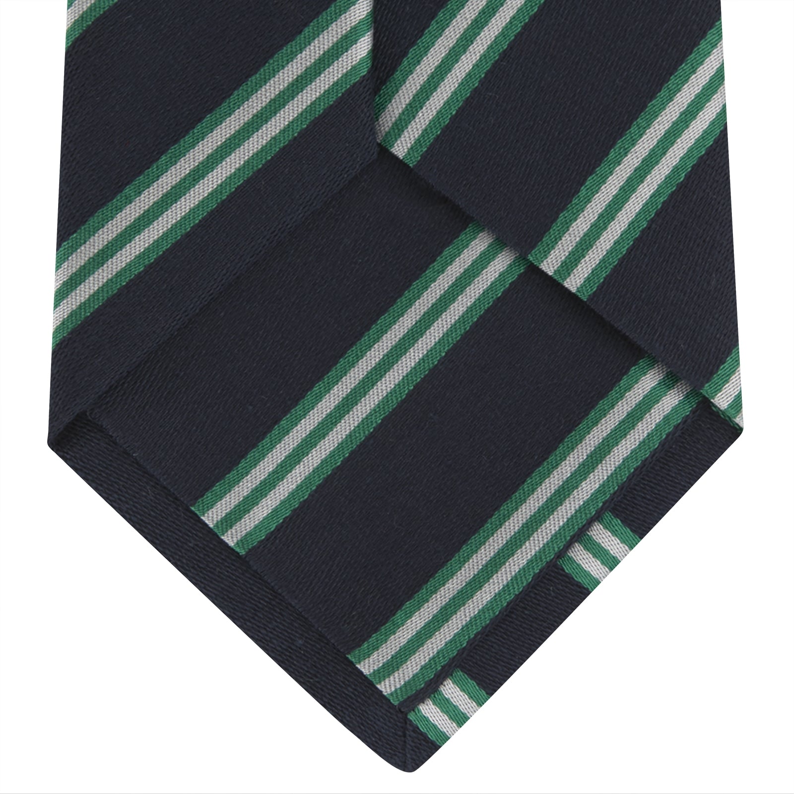View 4 of product The Turnbull & Asser Navy, Green and White Multi Repp Stripe Silk Tie features elegant diagonal stripes, making it a classic accessory for any occasion. Shown rolled on a white background.