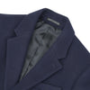 View 5 of product The Turnbull & Asser Navy Lambswool Joseph Overcoat, a men's knee-length coat with notched lapels, a single-breasted front, and three flap pockets per side, is shown against a plain white background.