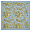 View 2 of product A folded Light Blue and Yellow Large Paisley Silk Pocket Square by Turnbull & Asser features an intricate paisley design. The brand name appears in white on the bottom right corner.