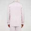View 3 of product The Turnbull & Asser Pink Piped Cotton Pyjama Set, featuring dark piping on the collar and front with matching pants, is elegantly displayed on a white background—a luxurious sleepwear choice.