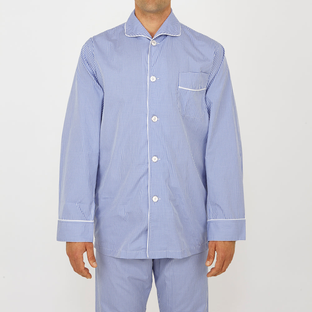 The Turnbull & Asser Mid Blue Gingham Check Piped Cotton Pyjama Set features white piping, two buttons, and a matching fabric belt, displayed on a white background—ideal for lovers of classic luxury sleepwear.