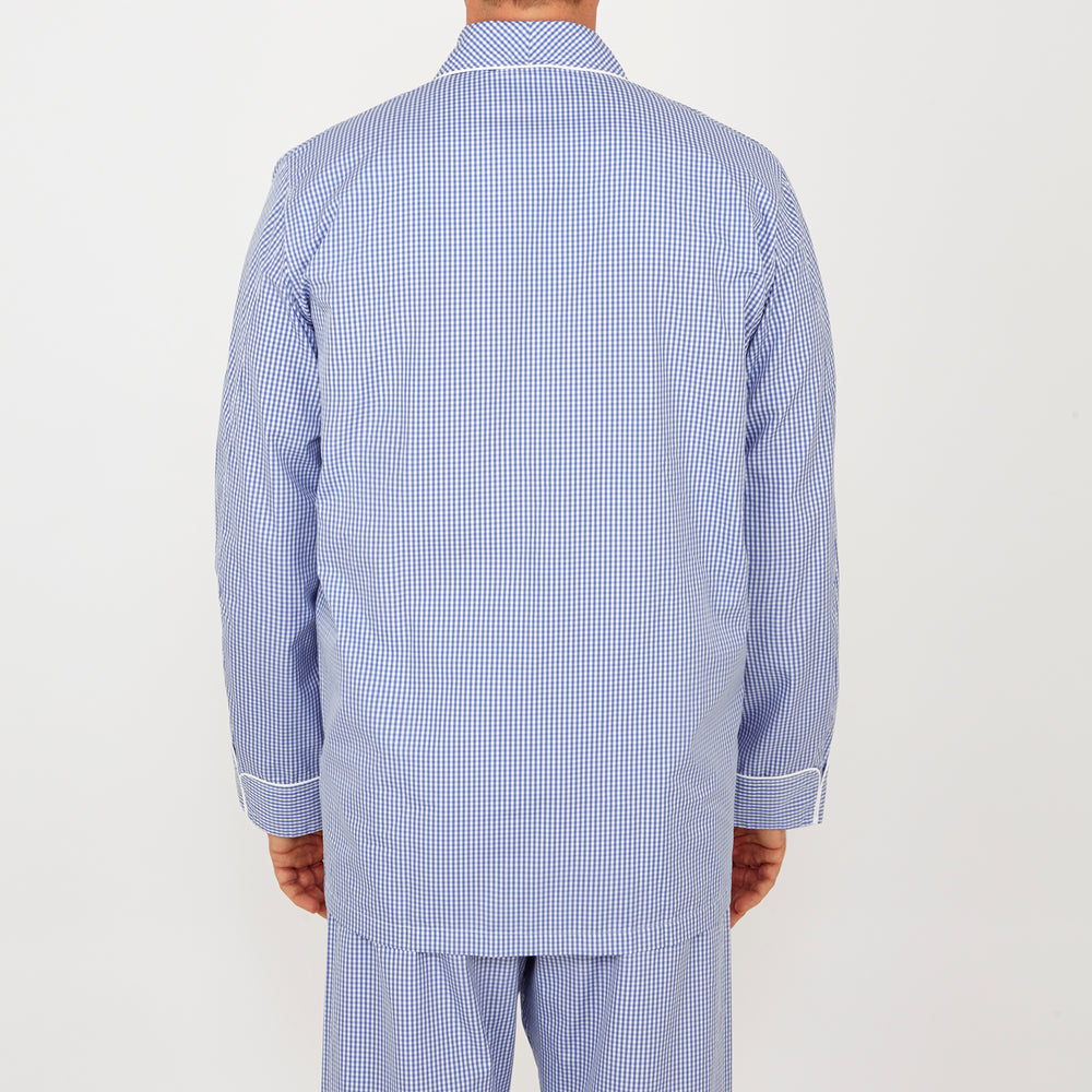 The Turnbull & Asser Mid Blue Gingham Check Piped Cotton Pyjama Set features white piping, two buttons, and a matching fabric belt, displayed on a white background—ideal for lovers of classic luxury sleepwear.