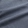View 6 of product A man in a tie wears the Turnbull & Asser Navy Check Regular Fit Flannel Shirt with T&A collar and 3 button cuffs.
