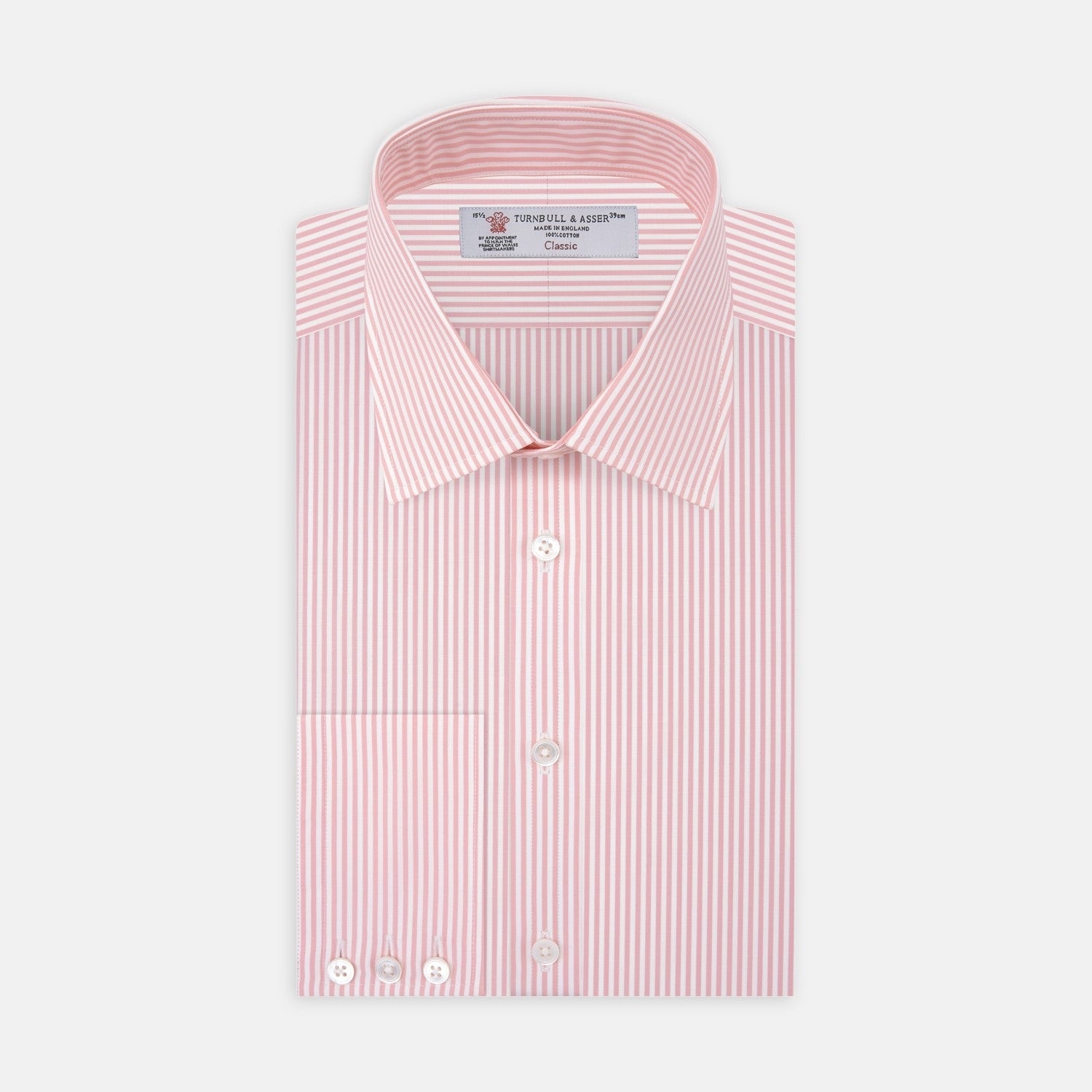 View 2 of product Close-up of Turnbull & Asser's Pink Bengal Stripe Cotton Fabric, featuring pink and white vertical stripes within a circular frame on a white background. A seam appears near the right edge of the fabric.
