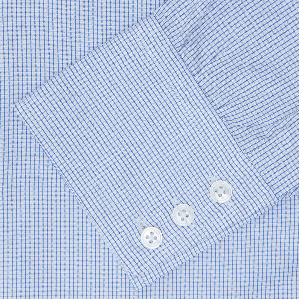 The Turnbull & Asser Blue Grid Check Shirt features a T&A collar, 3-button cuffs, and a refined blue and white grid pattern, displayed against a white background.