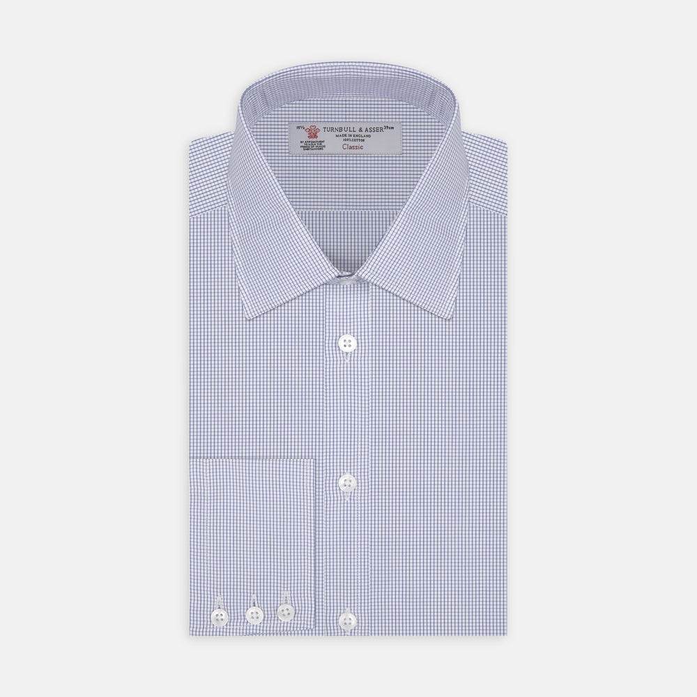 The Turnbull & Asser Blue Grid Check Shirt features a T&A collar, 3-button cuffs, and a refined blue and white grid pattern, displayed against a white background.