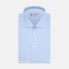 View 1 of product The Turnbull & Asser Blue Sea Island Quality Cotton Shirt features a Dr. No collar and button cuffs, crafted from fine cotton and shown neatly folded on a plain white background.