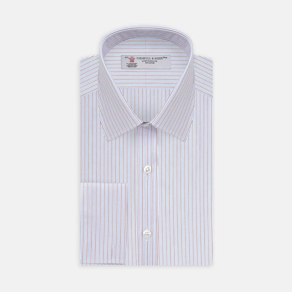 A close-up of Turnbull & Asser's Red and Navy Supraluxe Stripe Fabric, showing vertical blue, white, and red stripes within a circular frame on a plain light background.
