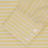 View 2 of product The Turnbull & Asser Yellow and White Bold Stripe Shirt features a T&A collar, 3-button cuffs, and white buttons. Displayed neatly folded on a plain white background, this long-sleeve shirt is perfect for office wear.