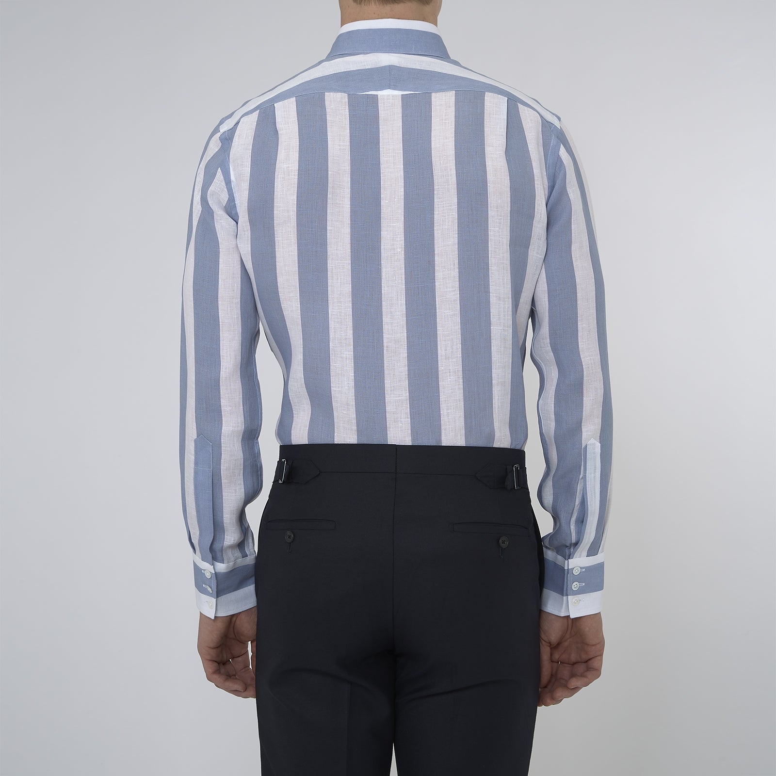 View 3 of product Turnbull & Asser's Tailored Fit Blue and White Stripe Linen Shirt features wide vertical stripes, a concealed button-down collar, and button cuffs—perfect for spring style.