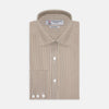 View 1 of product The Turnbull & Asser Tailored Fit Brown Fine Stripe Shirt features a Bury collar, 3-button cuffs, white buttons, and fine brown and white stripes. Made from premium Thomas Mason cotton and shown neatly folded on a plain white background.
