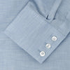 View 5 of product A neatly folded Tailored Fit Light Blue Flannel Shirt by Turnbull & Asser with a Bury collar and 3-button cuffs, displayed on a plain white background, features an inner collar label.