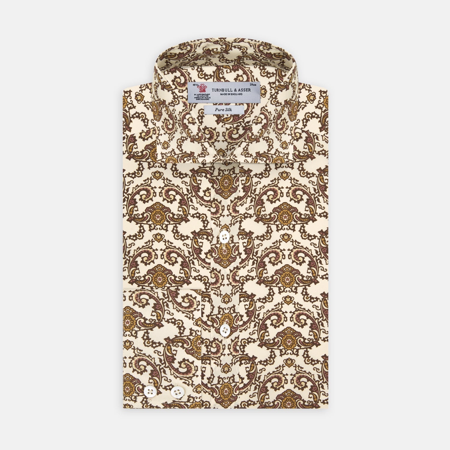View 1 of product The Turnbull & Asser Tailored Fit Cream Jagger Print Silk Shirt features a Kent collar, 2-button cuffs, and an intricate brown and gold print on cream silk for timeless elegance.