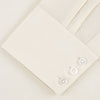 View 4 of product The Turnbull & Asser Weekend Fit Cream Herringbone Western Shirt features a Norfolk collar, button cuffs, and chest pockets, elegantly folded and displayed on a plain white background.