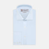 View 1 of product A neatly folded Turnbull & Asser Tailored Fit Two-Fold 120 Light Blue Shirt with a Kent collar and 3-button cuffs is displayed against a plain light gray background.