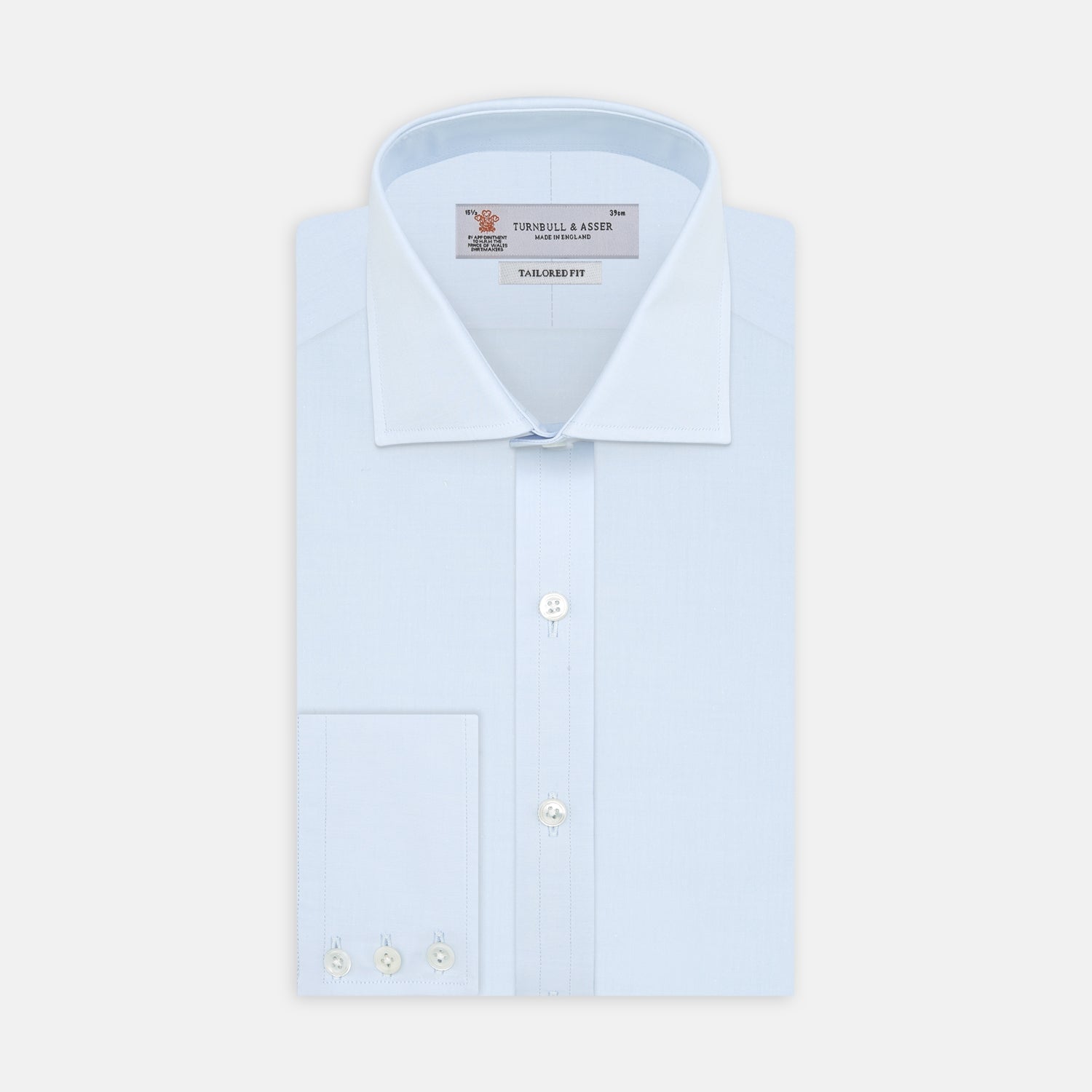 View 1 of product A neatly folded Turnbull & Asser Tailored Fit Two-Fold 120 Light Blue Shirt with a Kent collar and 3-button cuffs is displayed against a plain light gray background.