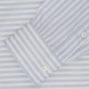 View 2 of product The Turnbull & Asser Weekend Fit Blue Stripe Cotton Shirt with Dorset collar and 1-button cuffs is laid flat on a white background, showcasing its classic long sleeves, striped design, and button-down front.