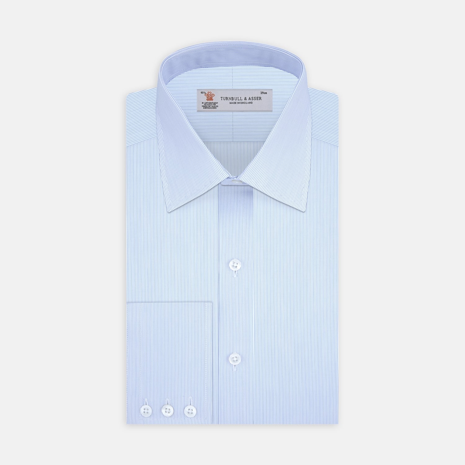 View 1 of product The Turnbull & Asser Blue Hairline Stripe Shirt features a T&A collar, double cuffs, white buttons, and a crisp design—ideal for the office. Displayed neatly folded on a plain white background.