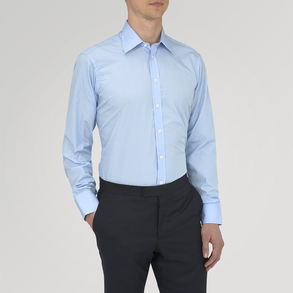The Turnbull & Asser Two-Fold 200 Blue Cotton Shirt features a T&A collar, 3-button cuffs, and white buttons—a refined men's dress shirt displayed on a plain white background.