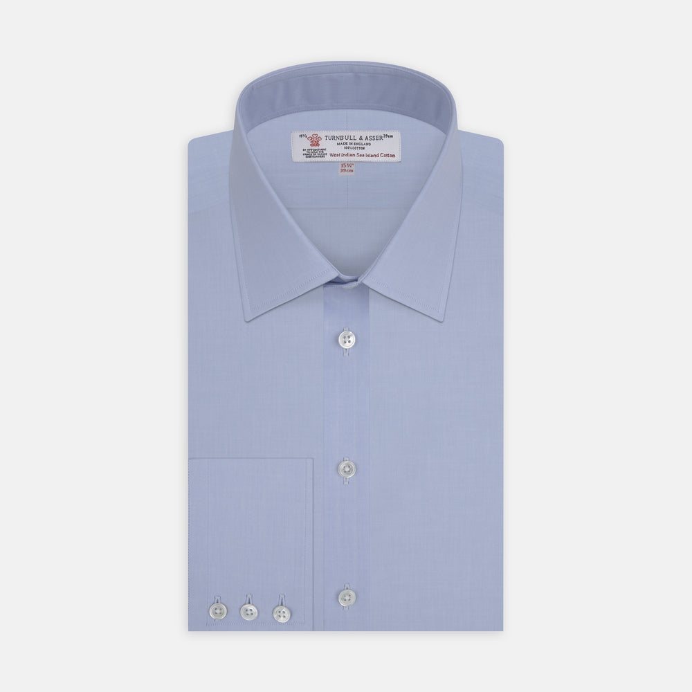The Turnbull & Asser Blue West Indian Sea Island Cotton Shirt features a T&A collar, 3-button cuffs, white buttons, a front chest pocket, and a monogrammed label inside the collar.