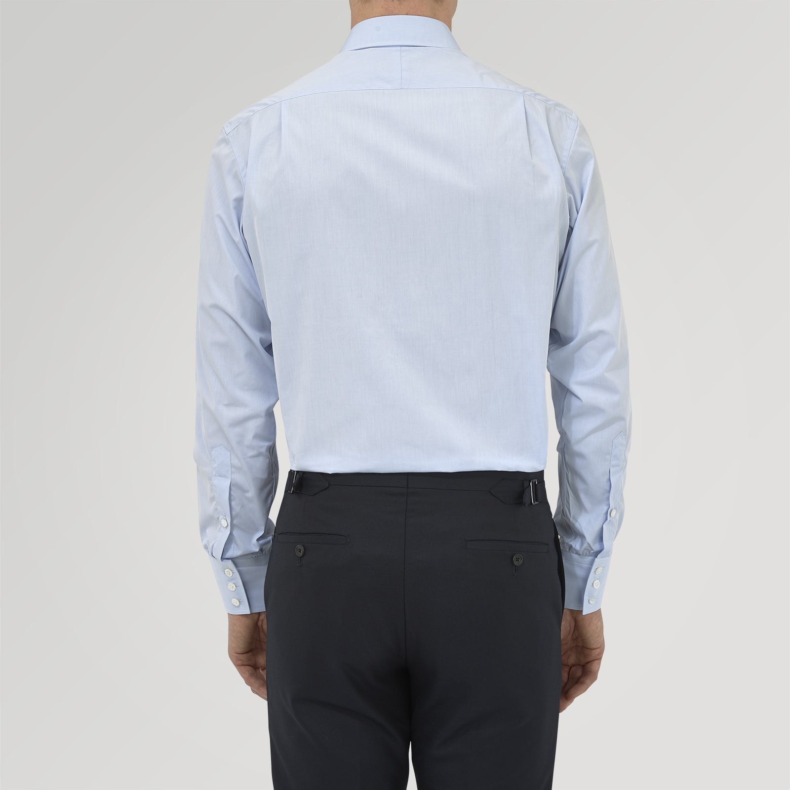 View 3 of product The Turnbull & Asser Blue West Indian Sea Island Cotton Shirt features a T&A collar, 3-button cuffs, white buttons, a front chest pocket, and a monogrammed label inside the collar.