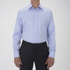 View 2 of product The Turnbull & Asser Blue Sea Island Quality Cotton Twill Shirt features a T&A collar, chest pocket, white buttons, and 3-button cuffs, all showcased on a plain white background.