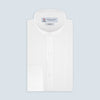 View 1 of product The Weekend Fit Cream Linen Shirt by Turnbull & Asser features a stand collar, button front, and 1-button cuff. Displayed neatly folded, the cream linen shirt highlights its refined craftsmanship against a light grey background.