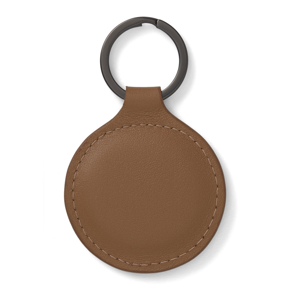 The Peanut Brown Leather Key Fob by Turnbull & Asser features embossed branding, MADE IN ENGLAND details, and a dark metal keyring.