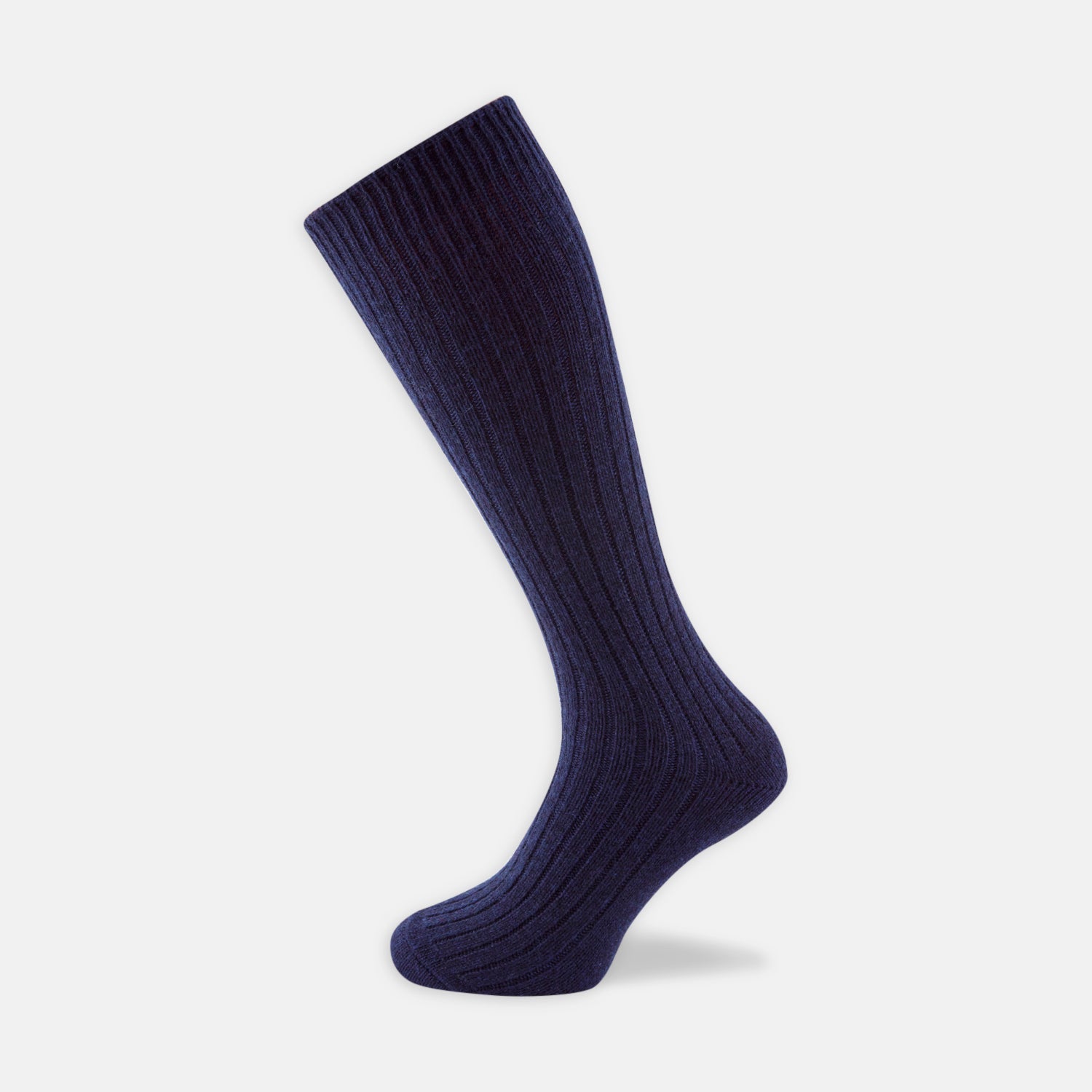 View 1 of product A single Turnbull & Asser Navy 3/4 Length Cashmere Sock is displayed on a white background, featuring a ribbed, fitted shape with subtle texture and breathable comfort for all-day wear.