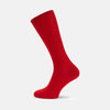 View 1 of product A single Red Mid-Length Merino Wool Sock from Turnbull & Asser, featuring a ribbed design, is displayed upright on a plain light gray background.