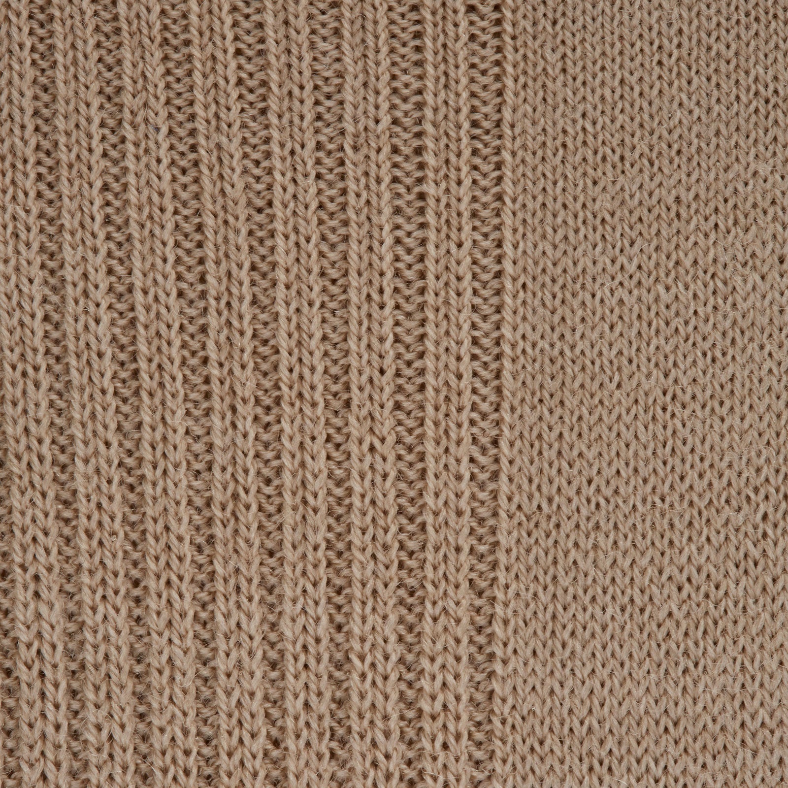 View 2 of product An Ecru Mid-Length Merino Wool Sock by Turnbull & Asser stands upright on a light gray background, showing both the heel and toe.