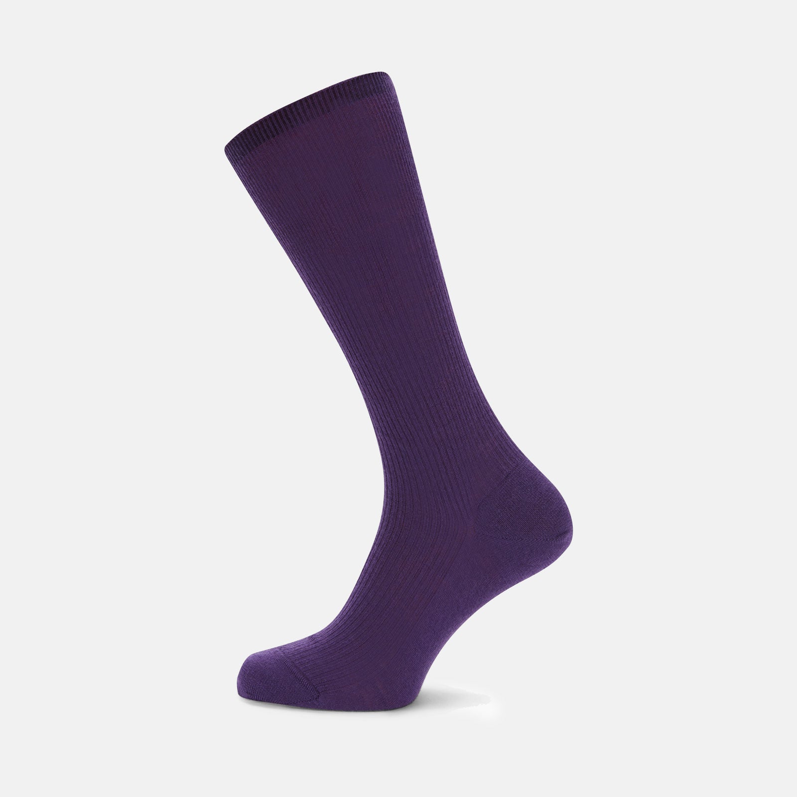 View 1 of product A single Turnbull & Asser Dark Purple Mid-Length Merino Wool Sock stands upright on a plain light gray background, showcasing its ribbed texture and reinforced toe and heel for premium quality.
