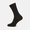 View 1 of product A single Black Short Cotton Sock from Turnbull & Asser is displayed upright on a light gray background, showcasing its side profile and subtle ribbed texture.