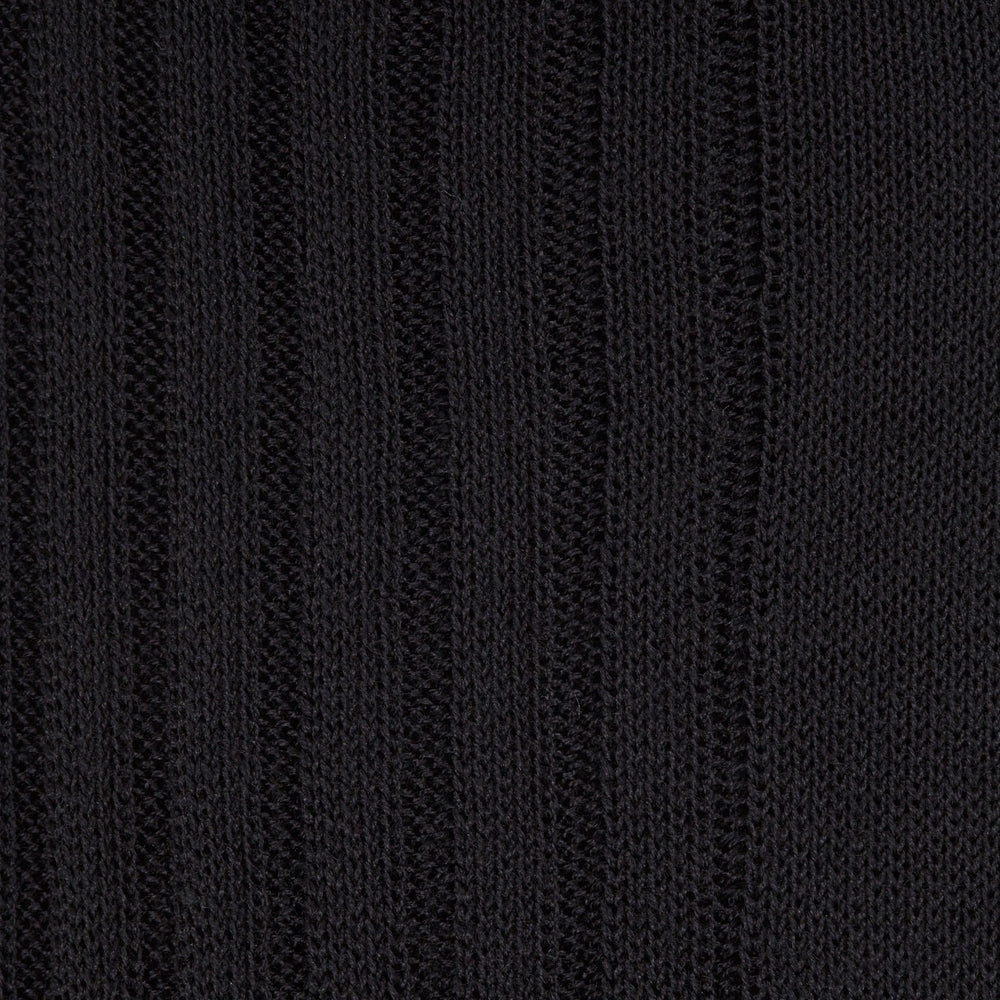 A single Black Short Cotton Sock from Turnbull & Asser is displayed upright on a light gray background, showcasing its side profile and subtle ribbed texture.