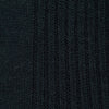 View 2 of product A single Racing Green Long Merino Wool Sock by Turnbull & Asser is shown on a light gray background, positioned as if worn to highlight its ribbed texture and comfortable fit.