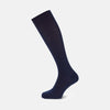 View 1 of product A single Turnbull & Asser Midnight Blue Long Merino Wool Sock with a ribbed texture is shown against a plain light gray background.