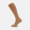 View 1 of product A single Ecru Long Cotton Sock by Turnbull & Asser is displayed on a white background, shown from the side to highlight its ribbed texture—crafted from fine cotton for a luxurious men’s sock.