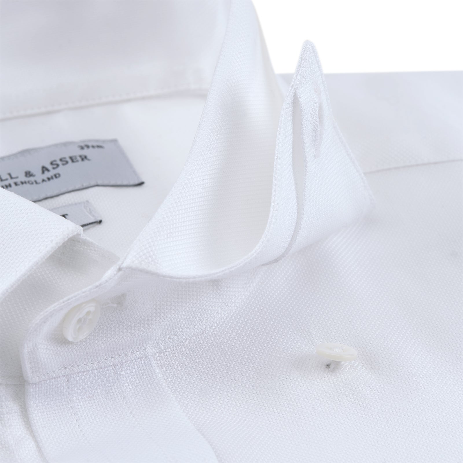 View 4 of product Turnbull & Asser's Tailored Fit Blue and White Stripe Linen Shirt features wide vertical stripes, a concealed button-down collar, and button cuffs—perfect for spring style.