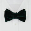 View 3 of product The Turnbull & Asser Green Velvet Bow Tie features a rich dark green hue and plush, smooth texture, ideal for formal events. Shown here against a plain white background.