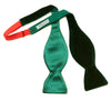 View 4 of product The Turnbull & Asser Green Velvet Bow Tie features a rich dark green hue and plush, smooth texture, ideal for formal events. Shown here against a plain white background.