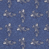View 3 of product The Blue Carp Silk Tie by Turnbull & Asser features a blue silk base with white and dark blue koi fish among light blue swirls. The tie is displayed rolled up, pointed end forward.