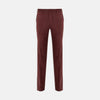 View 1 of product The Turnbull & Asser Copper Horizontal Corduroy Trousers are standout straight-leg burgundy pants with button and zip closure, shown against a plain white background.