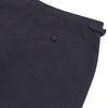 View 2 of product Turnbull & Asser Navy Cotton Seersucker Trousers, featuring a straight-leg fit, belt loops, and concealed front closure, crafted from lightweight Italian seersucker fabric, displayed on a plain white background.
